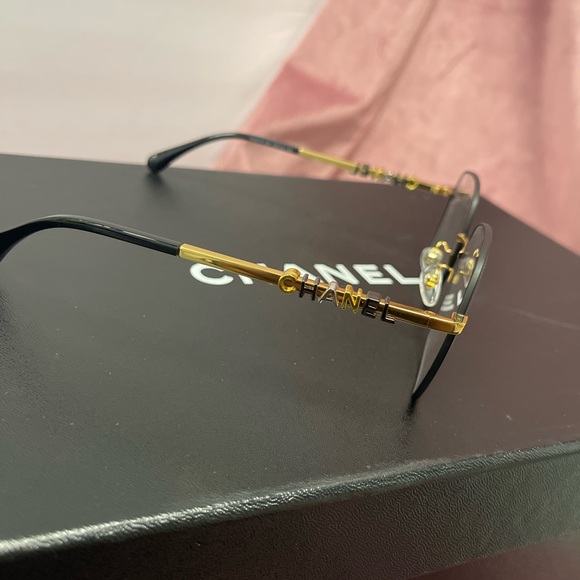 Chanel Gold and Black Eyeglasses - Picture 1 of 5